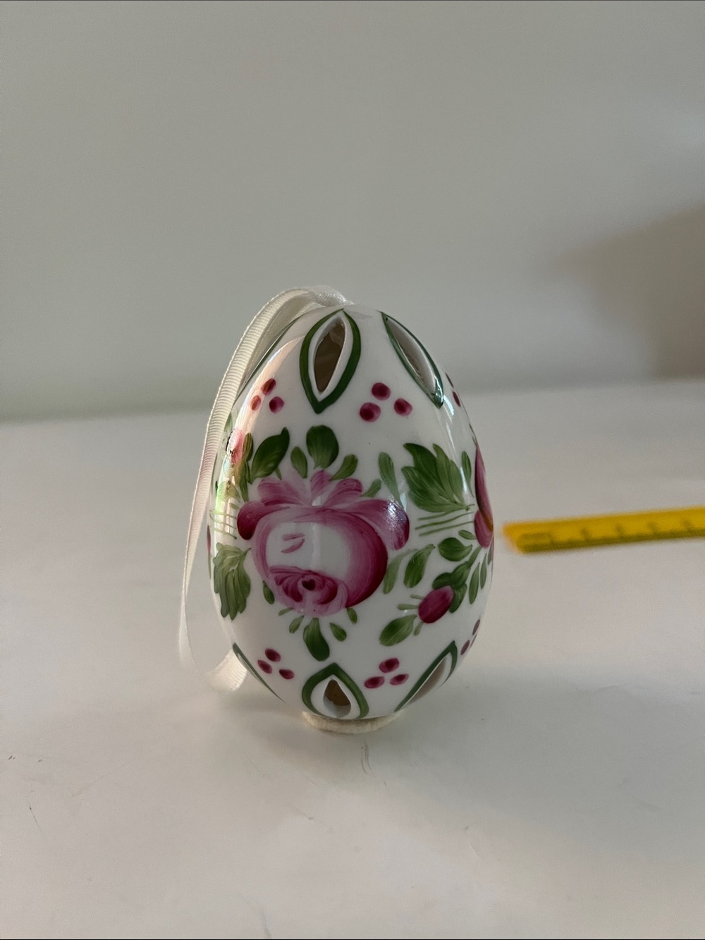 Hand-Painted Floral Porcelain Egg Ornament in White and Pink